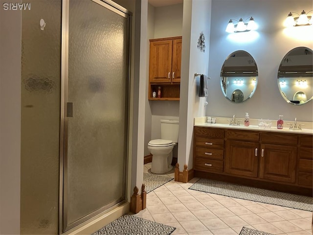 11996 County Road 3290, Rolla, MO 65401 - full bathroom with double vanity, a shower stall, and tile patterned floors