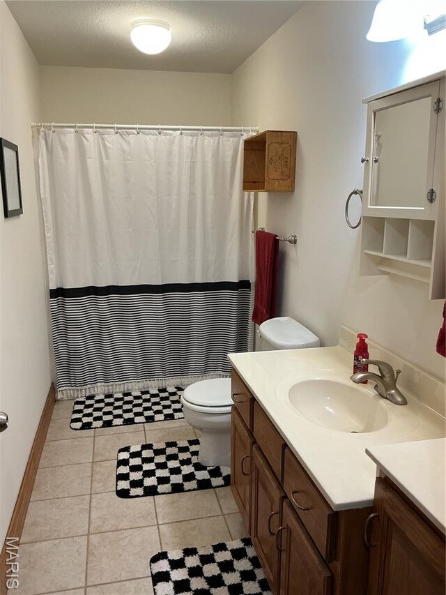 11996 County Road 3290, Rolla, MO 65401 - full bathroom featuring vanity, tile patterned flooring, and a shower with curtain