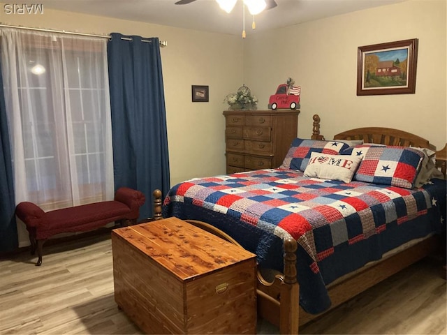 11996 County Road 3290, Rolla, MO 65401 - bedroom with wood finished floors and a ceiling fan