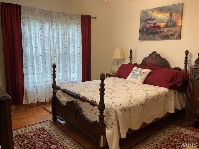 11996 County Road 3290, Rolla, MO 65401 - bedroom with wood finished floors