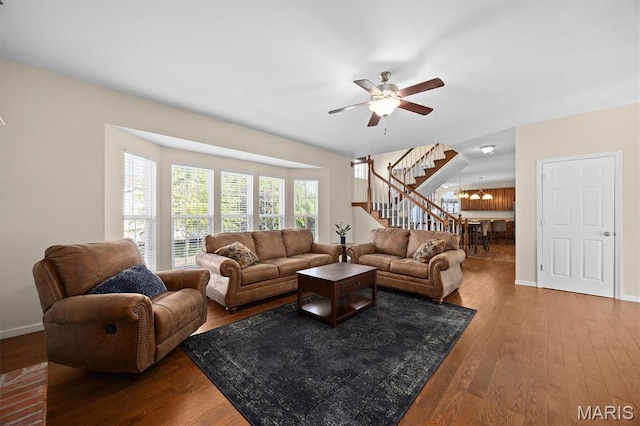 6817 Dunhill Dr, Fairview Heights, IL 62208 - living room with stairs, wood finished floors, and a ceiling fan