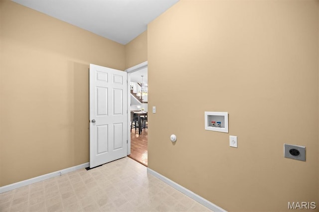 6817 Dunhill Dr, Fairview Heights, IL 62208 - washroom with hookup for an electric dryer, washer hookup, light flooring, and a chandelier