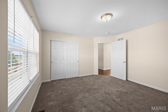 6817 Dunhill Dr, Fairview Heights, IL 62208 - unfurnished bedroom featuring carpet floors and a closet