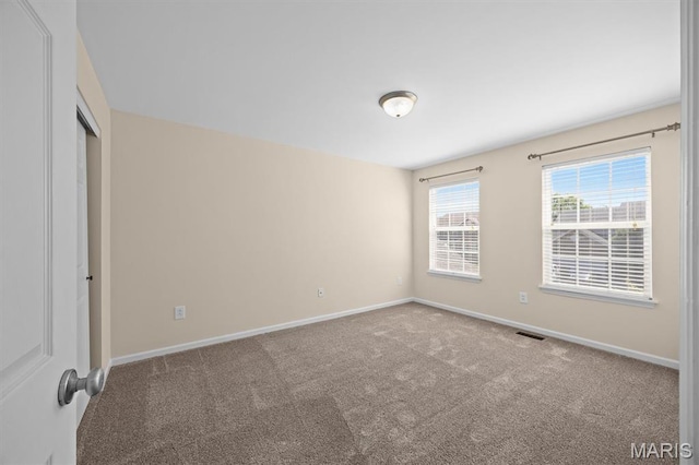 6817 Dunhill Dr, Fairview Heights, IL 62208 - carpeted spare room with baseboards