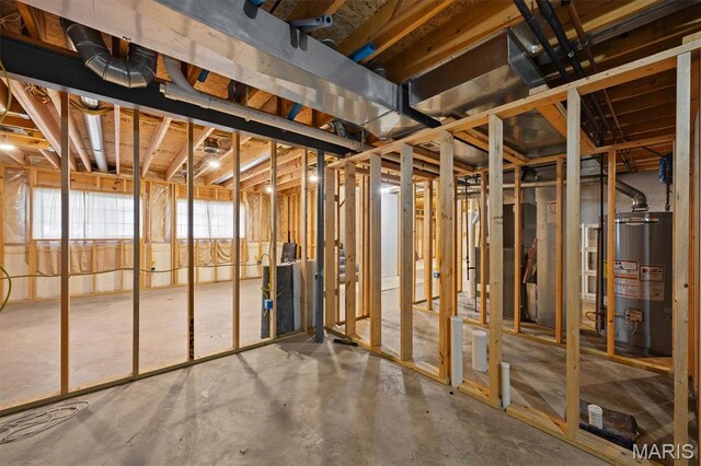 6817 Dunhill Dr, Fairview Heights, IL 62208 - miscellaneous room with water heater and concrete floors