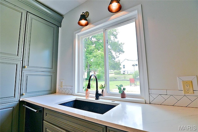 512 S 5th St, De Soto, MO 63020 - kitchen with light countertops and green cabinets