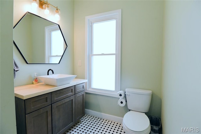 512 S 5th St, De Soto, MO 63020 - bathroom with vanity and tile patterned floors