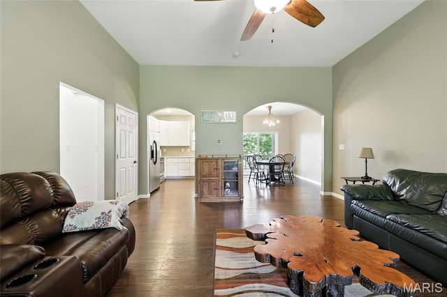 92 Lake Front Pt, Perryville, MO 63775 - living room featuring arched walkways, dark wood-style flooring, and a ceiling fan