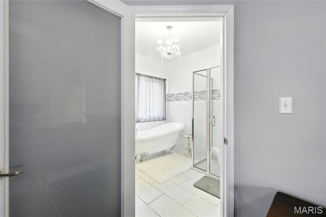 92 Lake Front Pt, Perryville, MO 63775 - full bath with a chandelier, a soaking tub, and a shower stall