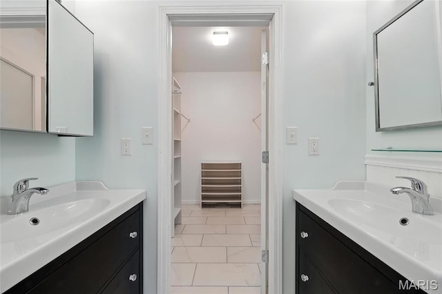 92 Lake Front Pt, Perryville, MO 63775 - full bath with two vanities, marble look tiles, and a walk in closet