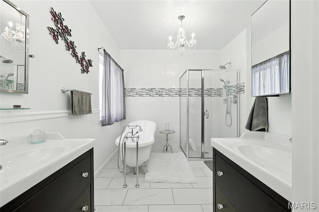 92 Lake Front Pt, Perryville, MO 63775 - full bathroom featuring a shower stall, two vanities, a chandelier, a freestanding tub, and plenty of natural light