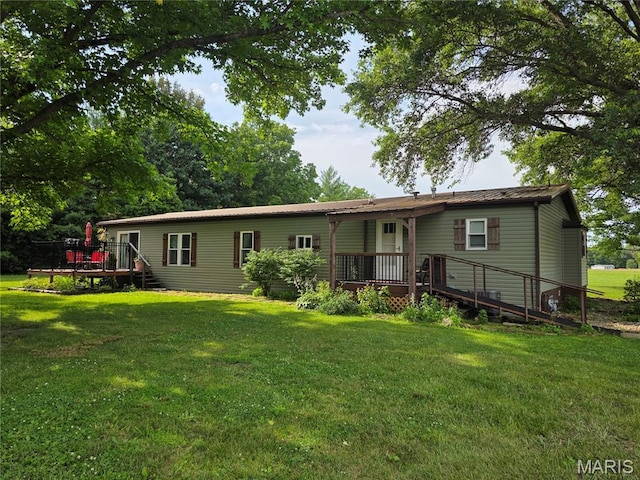 402 Il Route 143, Pocahontas, IL 62275 - back of property with a wooden deck and a lawn