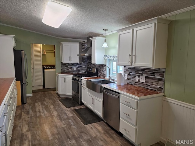 402 Il Route 143, Pocahontas, IL 62275 - kitchen featuring stainless steel appliances, wall chimney exhaust hood, washer / clothes dryer, backsplash, and dark wood-style flooring