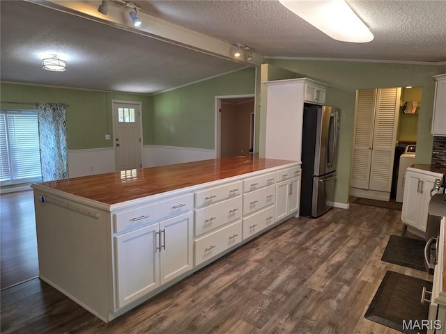 402 Il Route 143, Pocahontas, IL 62275 - kitchen with freestanding refrigerator, a textured ceiling, washer / clothes dryer, rail lighting, and white cabinets