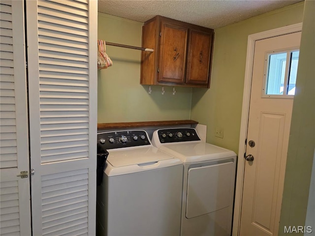 402 Il Route 143, Pocahontas, IL 62275 - washroom featuring cabinet space, washer and clothes dryer, and a textured ceiling