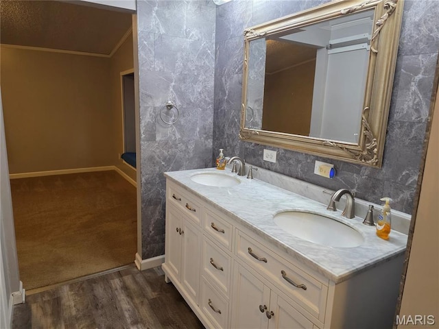 402 Il Route 143, Pocahontas, IL 62275 - full bathroom featuring double vanity, ornamental molding, and wood finished floors