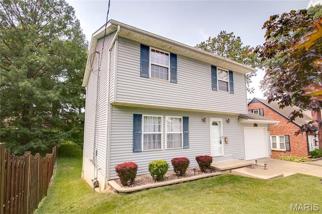 2933 Forest Dr, Alton, IL 62002 - colonial house featuring driveway and an attached garage