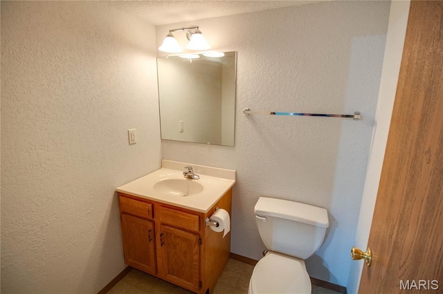 2933 Forest Dr, Alton, IL 62002 - bathroom featuring vanity and a textured wall