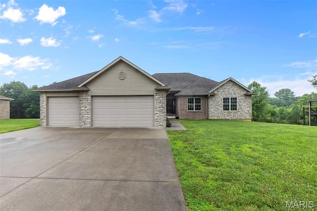 226 Indian Springs Dr, Jackson, MO 63755 - ranch-style house featuring stone siding, a front lawn, concrete driveway, and a garage