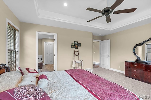 226 Indian Springs Dr, Jackson, MO 63755 - carpeted bedroom with a tray ceiling, multiple windows, and recessed lighting