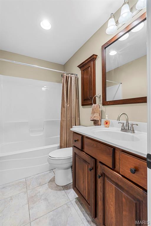 226 Indian Springs Dr, Jackson, MO 63755 - full bath with vanity, shower / tub combo, tile patterned flooring, and recessed lighting