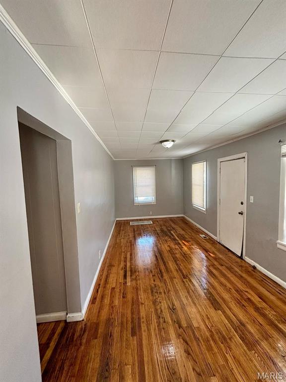 10109 Imperial Dr, Saint Louis, MO 63136 - unfurnished room with ornamental molding and wood-type flooring