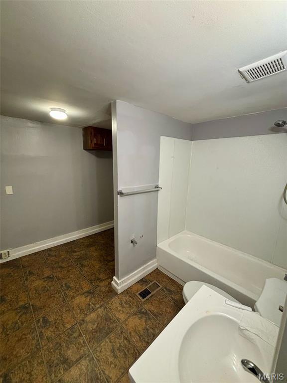 10109 Imperial Dr, Saint Louis, MO 63136 - bathroom featuring a tub to relax in and a shower