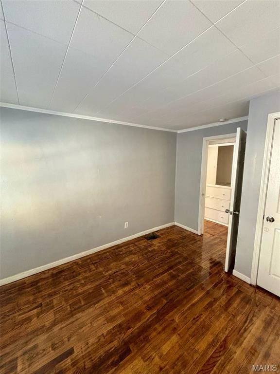 10109 Imperial Dr, Saint Louis, MO 63136 - spare room featuring wood finished floors and crown molding