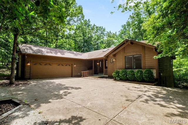 976 Aspenetter Dr, Innsbrook, MO 63390 - view of front of house with concrete driveway and a garage