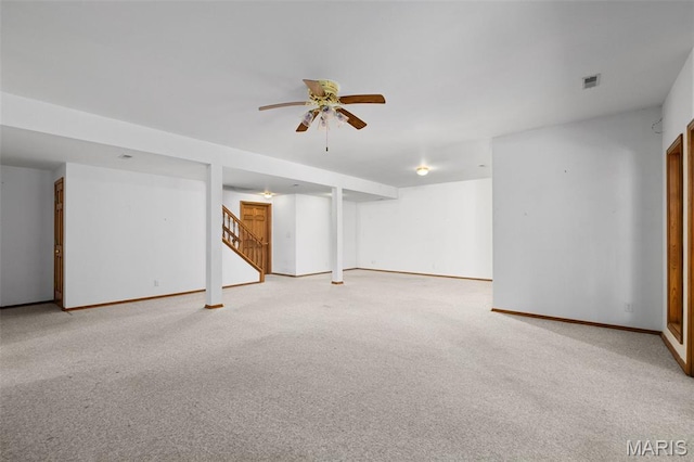 976 Aspenetter Dr, Innsbrook, MO 63390 - finished basement featuring stairs, a ceiling fan, and light colored carpet