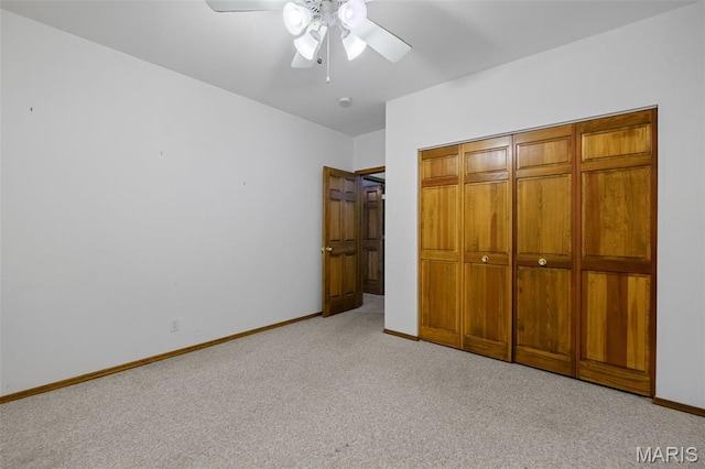 976 Aspenetter Dr, Innsbrook, MO 63390 - unfurnished bedroom with light carpet, a closet, and a ceiling fan