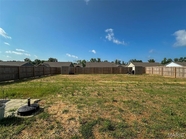 326 Apple Park Way, Poplar Bluff, MO 63901 - fenced backyard featuring a storage unit and a residential view