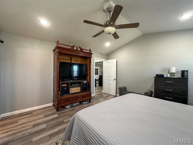 326 Apple Park Way, Poplar Bluff, MO 63901 - bedroom featuring wood finished floors, vaulted ceiling, ceiling fan, and recessed lighting