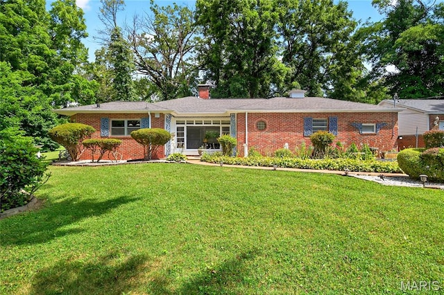 351 N 66th St, Belleville, IL 62223 - ranch-style home with brick siding, a front lawn, and a chimney