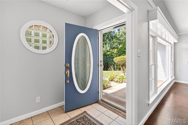 351 N 66th St, Belleville, IL 62223 - foyer entrance featuring baseboards and light tile patterned flooring