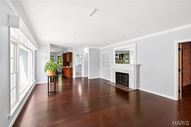 351 N 66th St, Belleville, IL 62223 - unfurnished living room featuring a high end fireplace, dark wood finished floors, ornamental molding, and recessed lighting