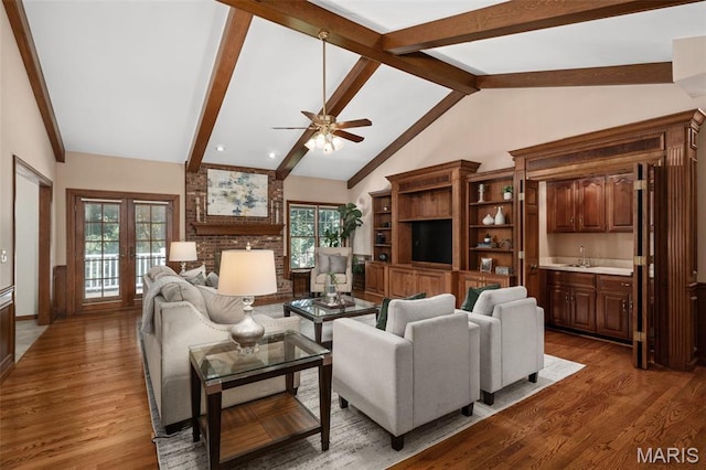 649 Westledge Ct, Des Peres, MO 63131 - living room with wood finished floors, ceiling fan, and bar with sink