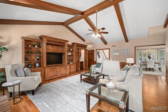 649 Westledge Ct, Des Peres, MO 63131 - living area with wood finished floors, stairs, and ceiling fan