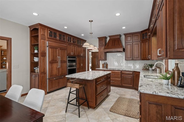 649 Westledge Ct, Des Peres, MO 63131 - kitchen featuring premium range hood, paneled fridge, recessed lighting, backsplash, and double oven