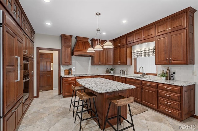 649 Westledge Ct, Des Peres, MO 63131 - kitchen featuring custom range hood, paneled refrigerator, a kitchen bar, tasteful backsplash, and recessed lighting