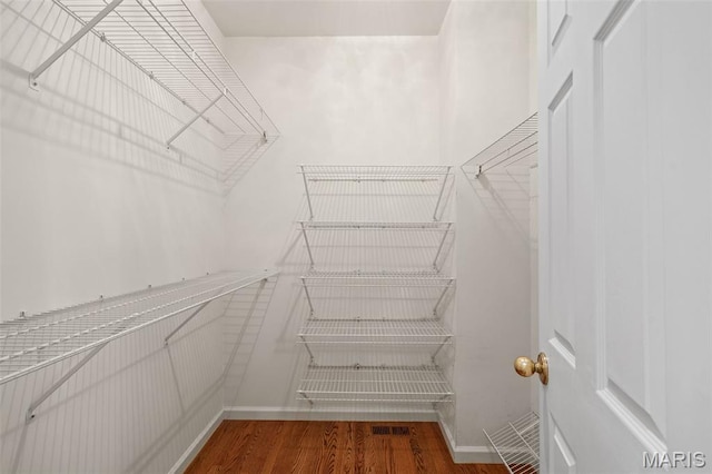 649 Westledge Ct, Des Peres, MO 63131 - spacious closet with wood finished floors