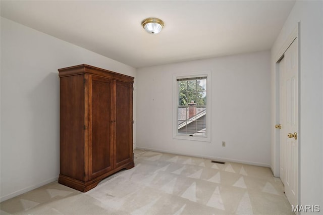 649 Westledge Ct, Des Peres, MO 63131 - unfurnished bedroom with light colored carpet and baseboards