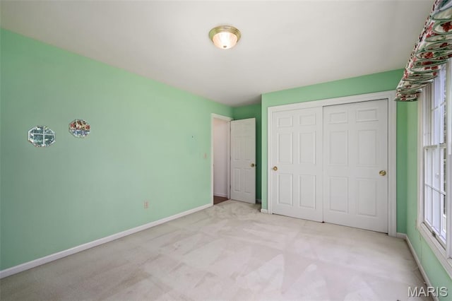 649 Westledge Ct, Des Peres, MO 63131 - unfurnished bedroom featuring carpet floors and a closet