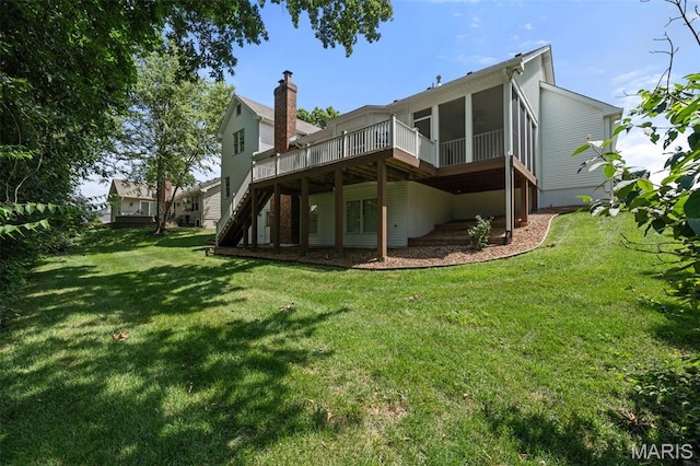 649 Westledge Ct, Des Peres, MO 63131 - rear view of property featuring a wooden deck, a lawn, a sunroom, and stairs
