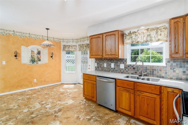 170 Coventry Way, Highland, IL 62249 - kitchen with stainless steel dishwasher, light countertops, brown cabinets, and backsplash