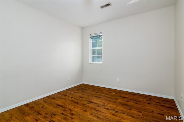 170 Coventry Way, Highland, IL 62249 - empty room with wood finished floors