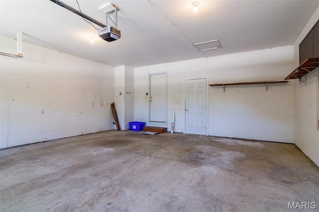 170 Coventry Way, Highland, IL 62249 - garage featuring a garage door opener