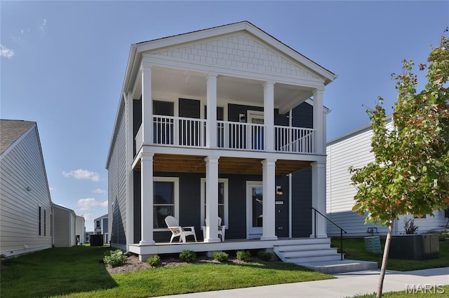 3092 Pirogue St, Saint Charles, MO 63301 - greek revival inspired property featuring a balcony, a porch, and a front yard