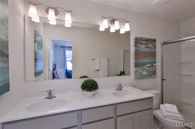 3092 Pirogue St, Saint Charles, MO 63301 - bathroom featuring double vanity, ensuite bathroom, and a shower with shower door