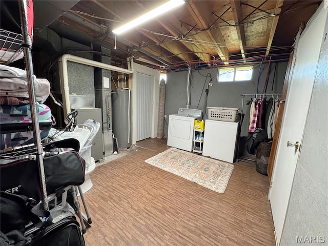 56319 Meyer Trl, Hannibal, MO 63401 - basement with washer and dryer, gas water heater, and a textured wall